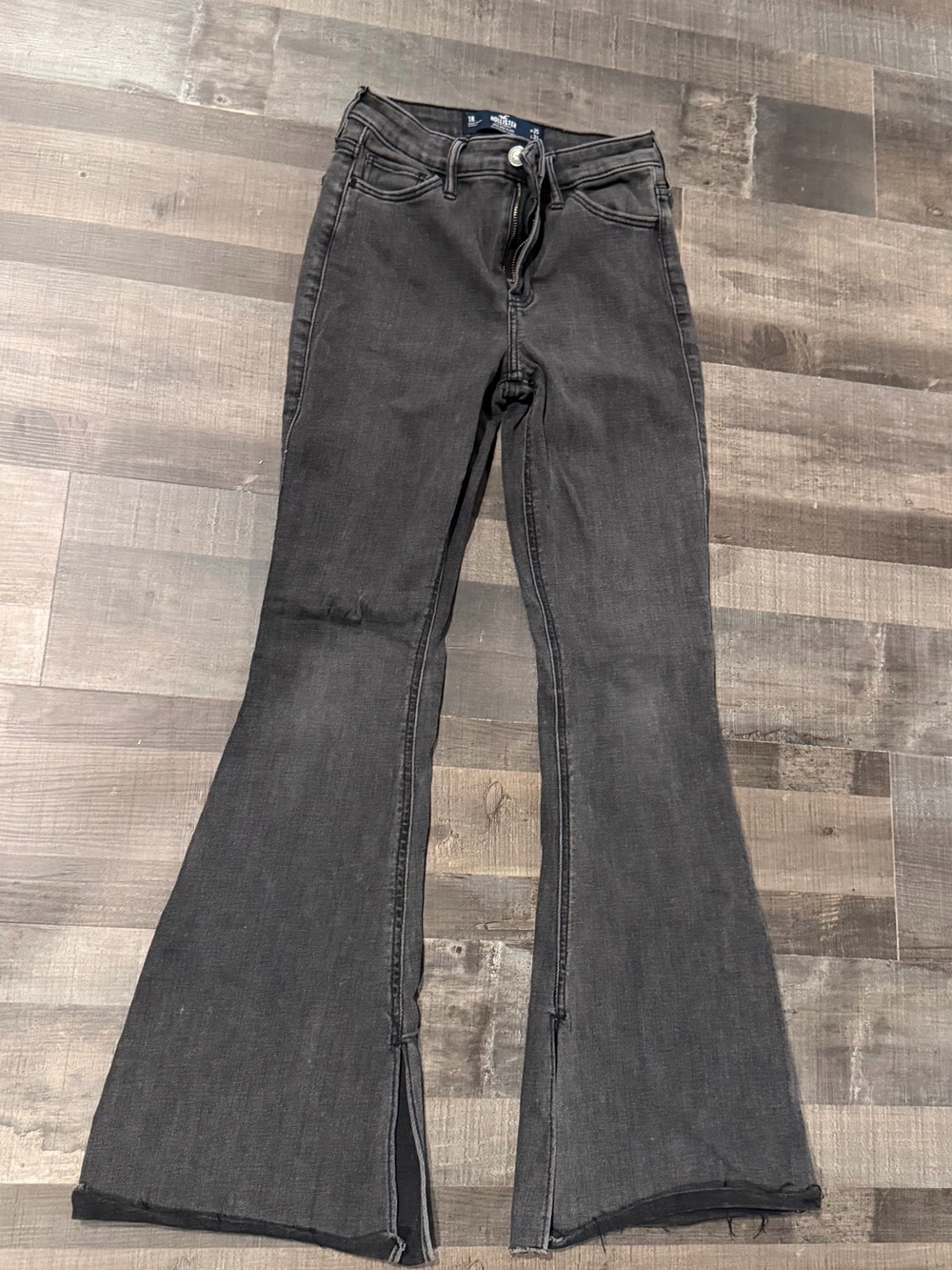 Women’s Faded Black Flare Jeans with Side Slit